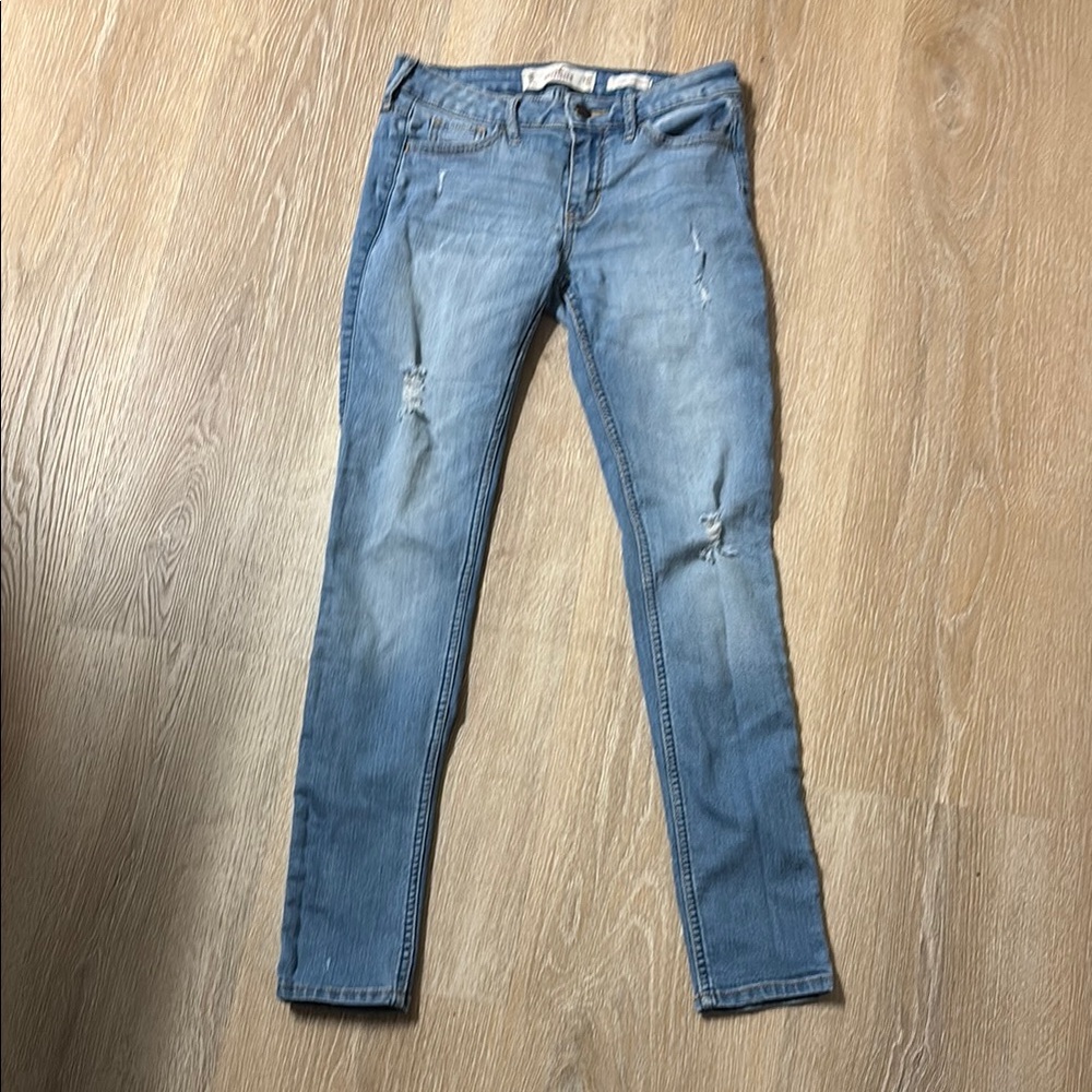 Low rise Hollister Blue Skinny Jeans with Distressed Details